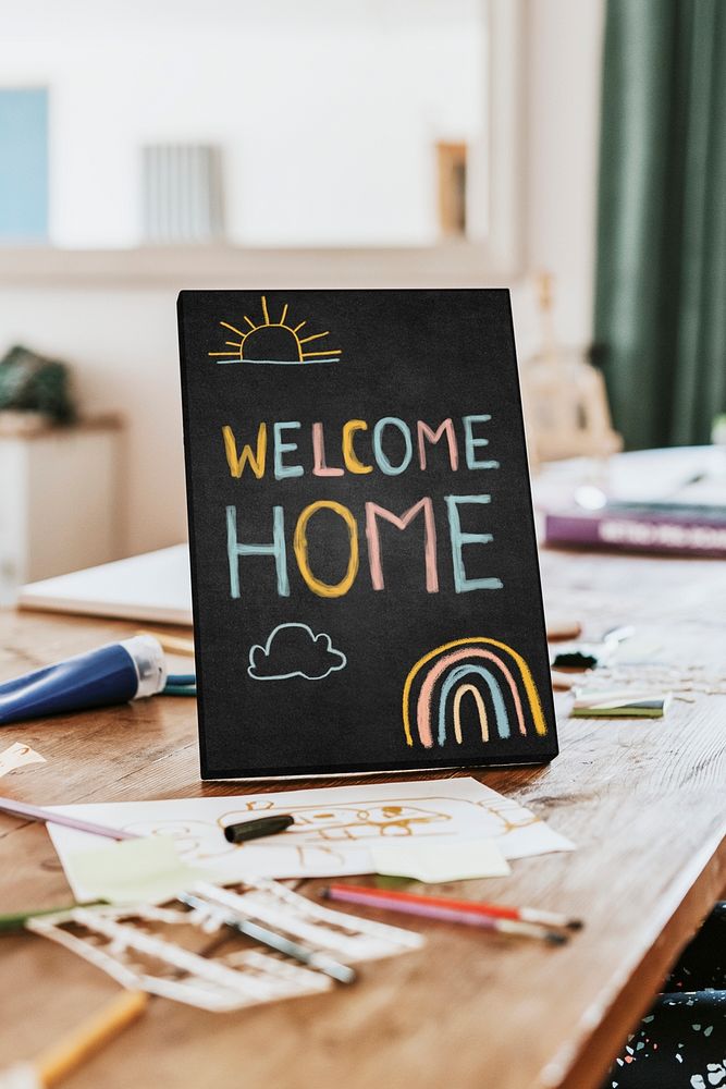 Sign mockup psd, blank design space on wooden table, welcome home text