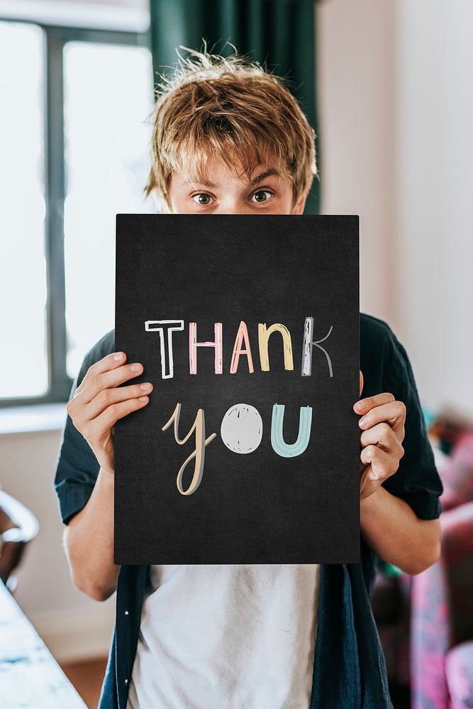 Sign mockup psd, held by a boy, blank design space, thank you text