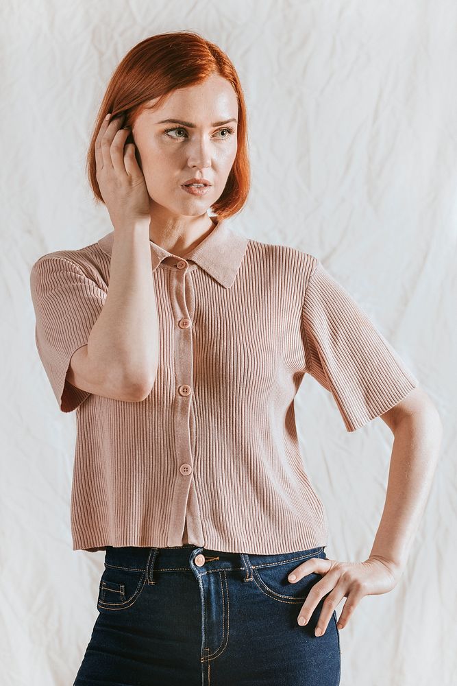 Woman in beige knitted shirt