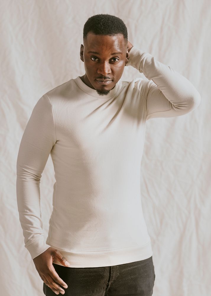 Black man wearing white long sleeve, autumn apparel fashion design