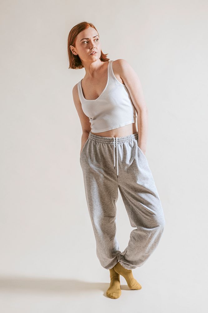 Woman in gray loungewear, tank top and pants