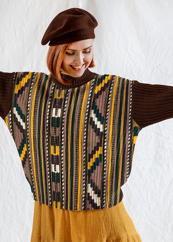 Happy woman in patterned brown sweater, autumn apparel fashion design