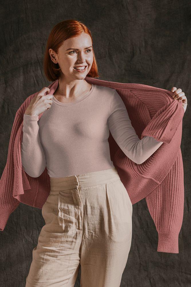 Happy woman in pink cardigan, autumn apparel fashion design