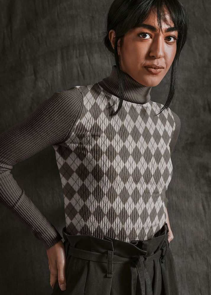 Woman in gray plaid turtleneck sweater, autumn apparel fashion design