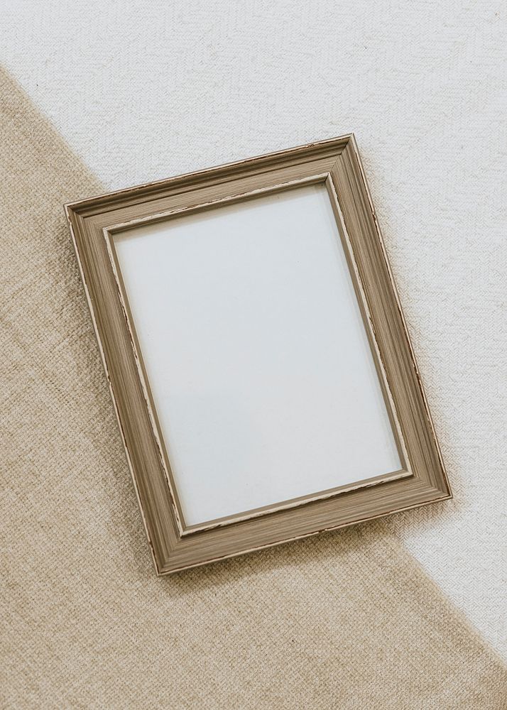 Wooden picture frame on floor, minimal design
