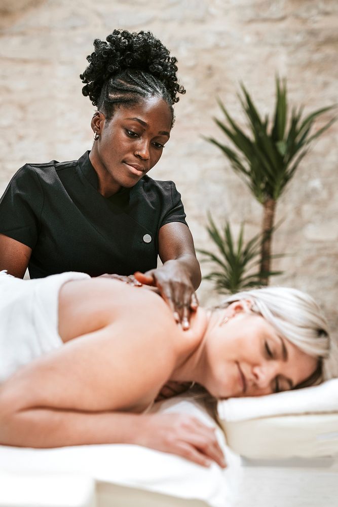 Woman enjoying massage therapy, self-care concept