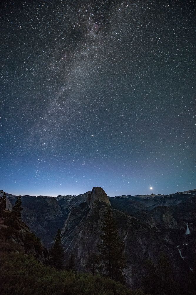 The Milky Way across the night sky in Yosemite Valley California, USA