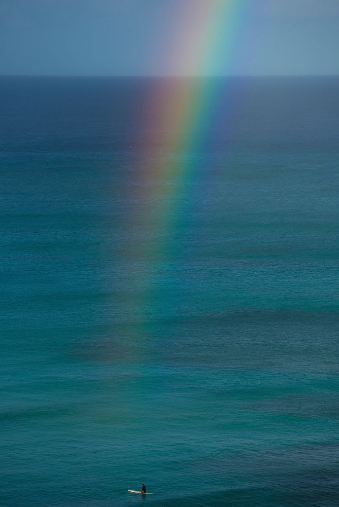 Rainbow streak with a blue ocean