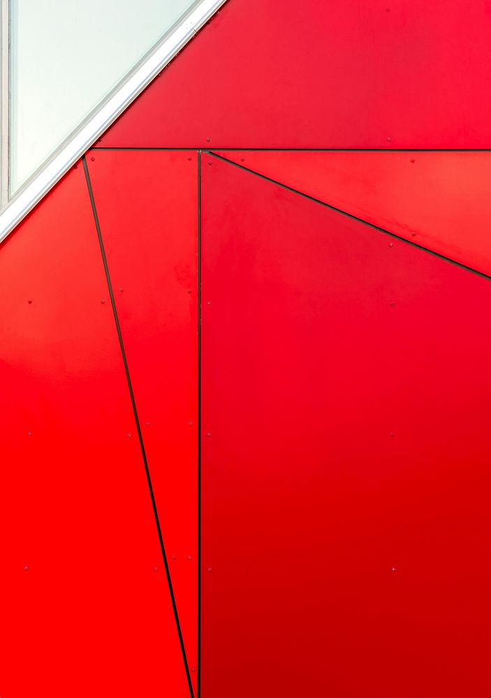 Red artistic wall surface of Canadian Centre for Product Validation, London, Canada