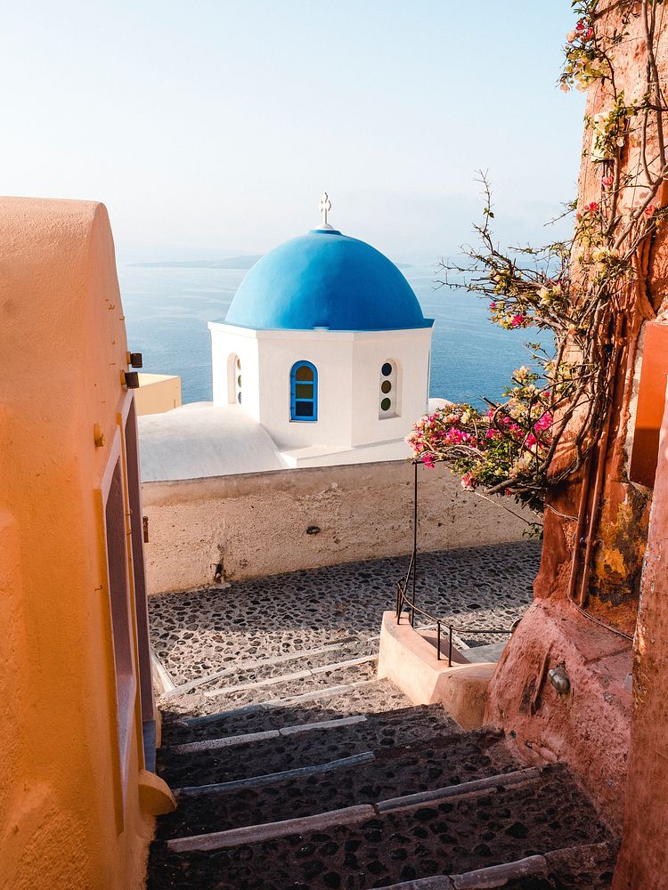 View of whitewashed and blue domed church in Santorini, Greece