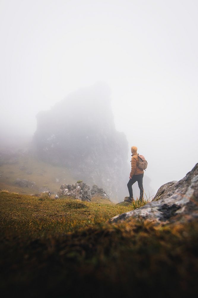 Man trekking in the misty Isle of Skye, Scotland