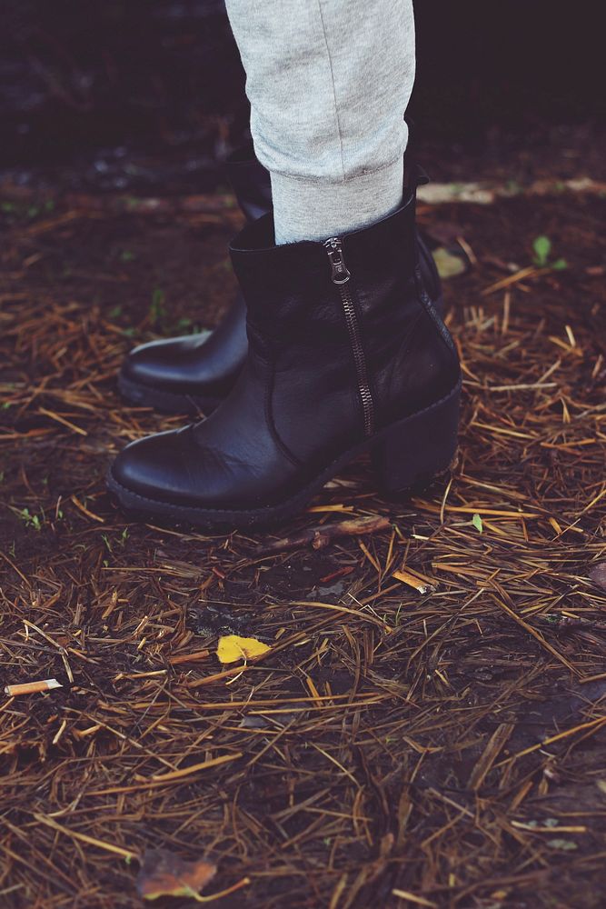 Woman wearing short boots. Visit Kaboompics for more free images.