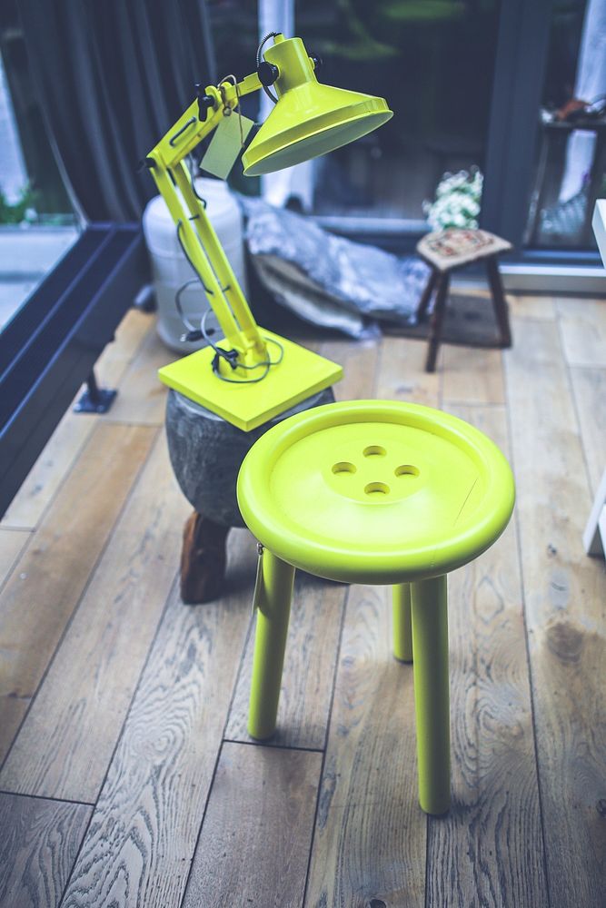 Bright green stool and lamp. Visit Kaboompics for more free images.