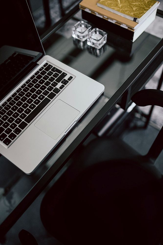 Laptop on a table. Visit Kaboompics for more free images.