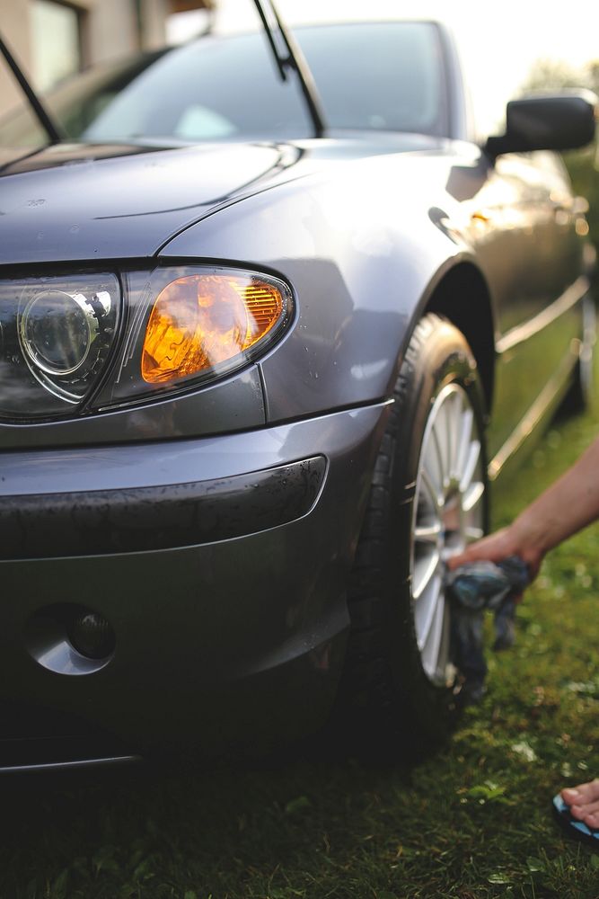 Man fixing the tires. Visit Kaboompics for more free images.