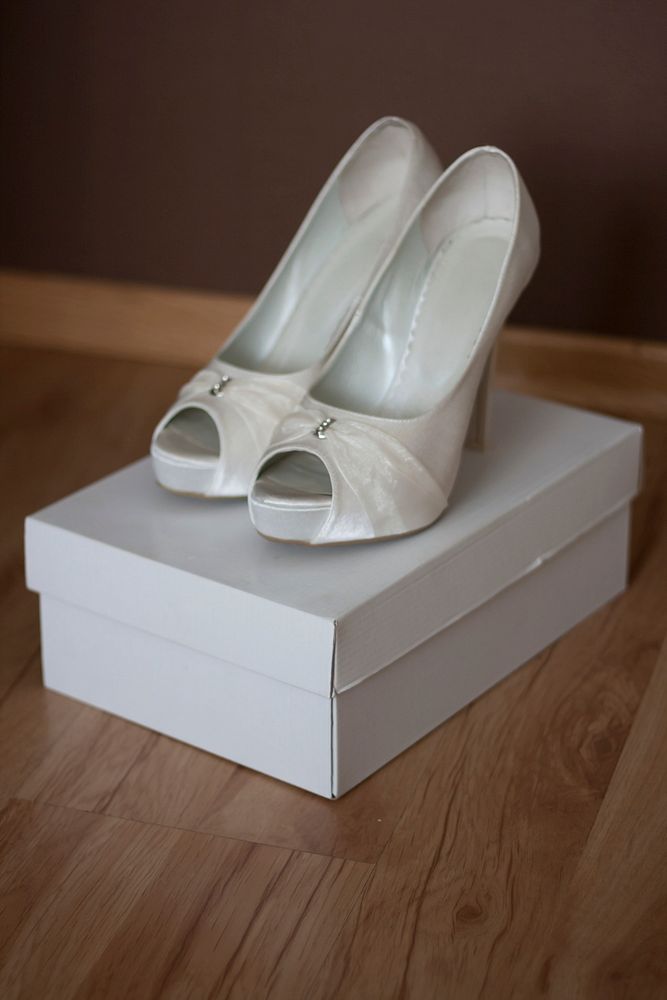 White bridal pumps. Visit Kaboompics for more free images.