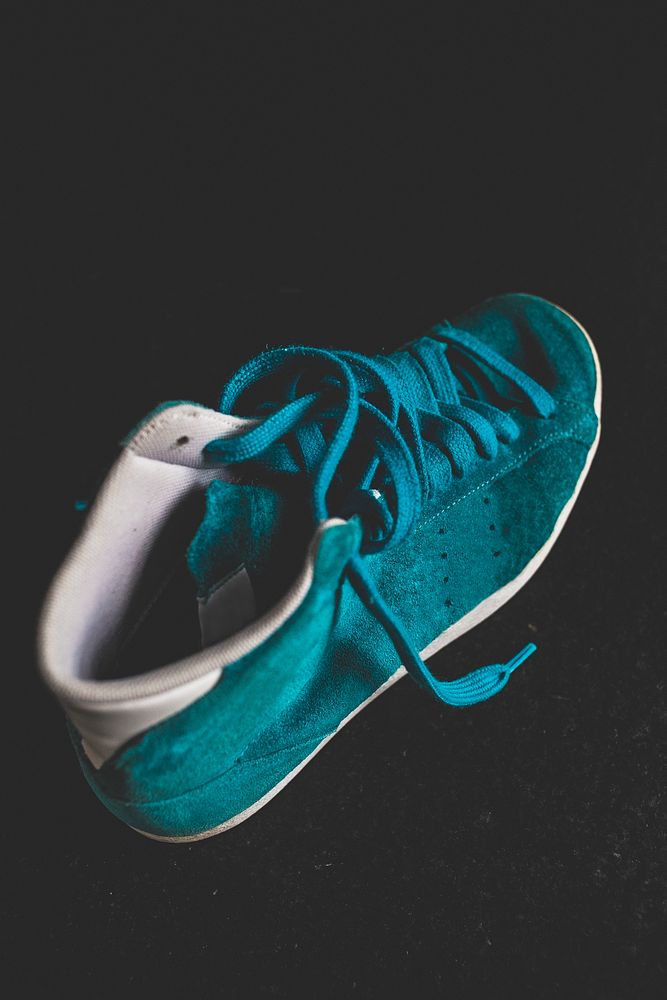Closeup of a blue suede sneaker
