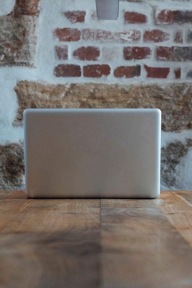 Laptop on a wooden desk