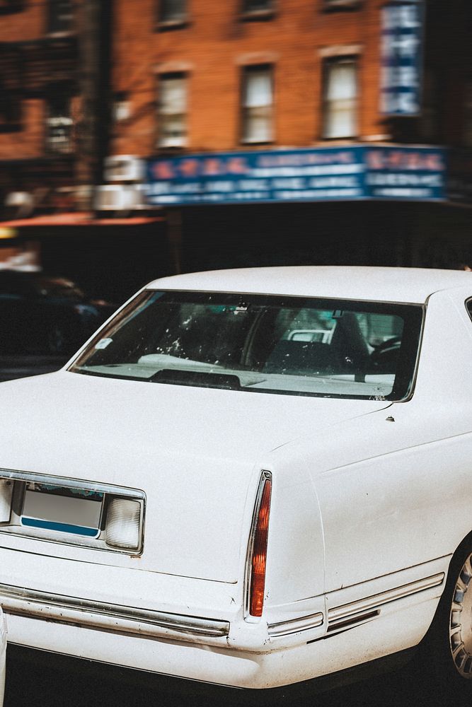 Old white car in New York City, United States