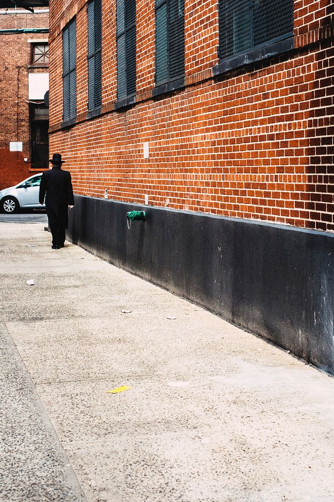 Orthodox Jewish man walking in New York City, United States