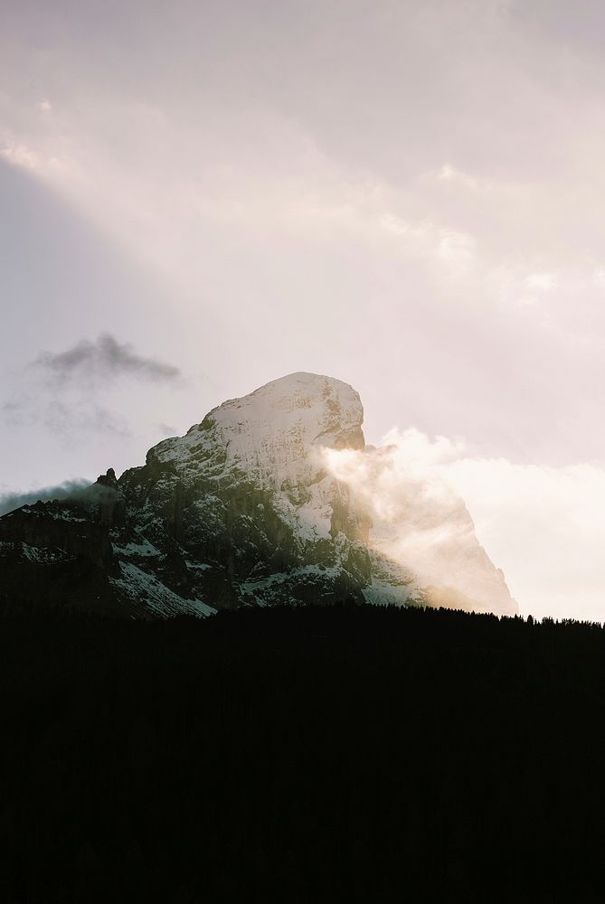 Sunlight  shining over the snow topped mountain