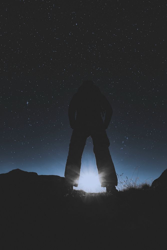 Man standing under the starry sky