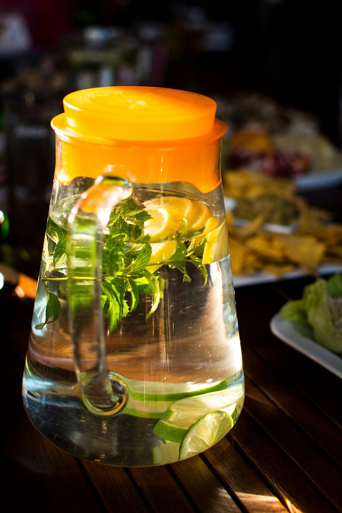 Water with lemon and mint in jug