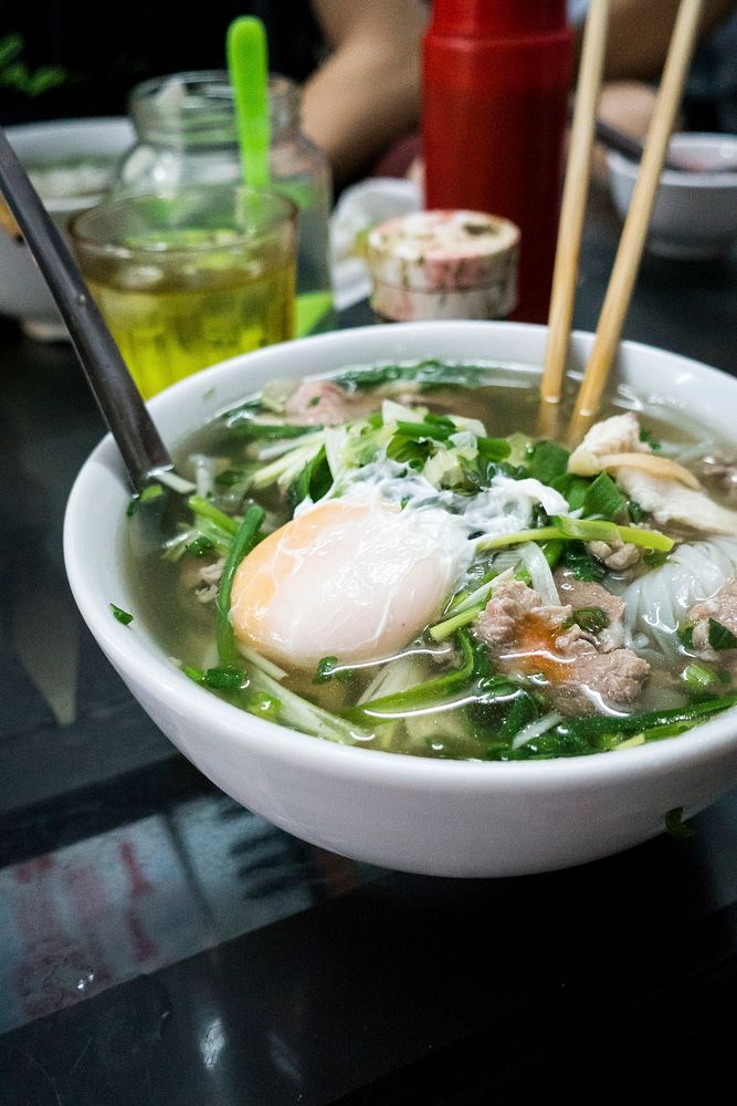 Eating Pho, a Vietnamese noodle soup