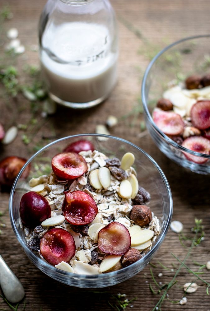 Breakfast granola bowl with fresh cherries. Visit Monika Grabkowska to see more of her food photography.