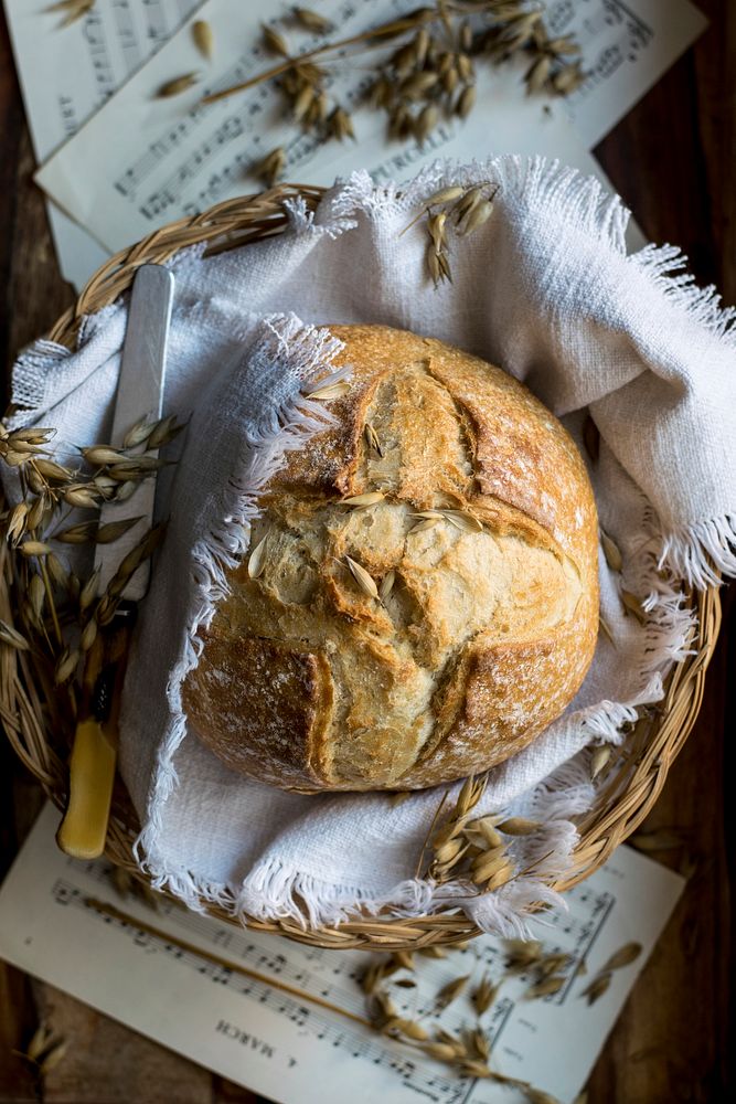 Homemade round bread with oats. Visit Monika Grabkowska to see more of her food photography.