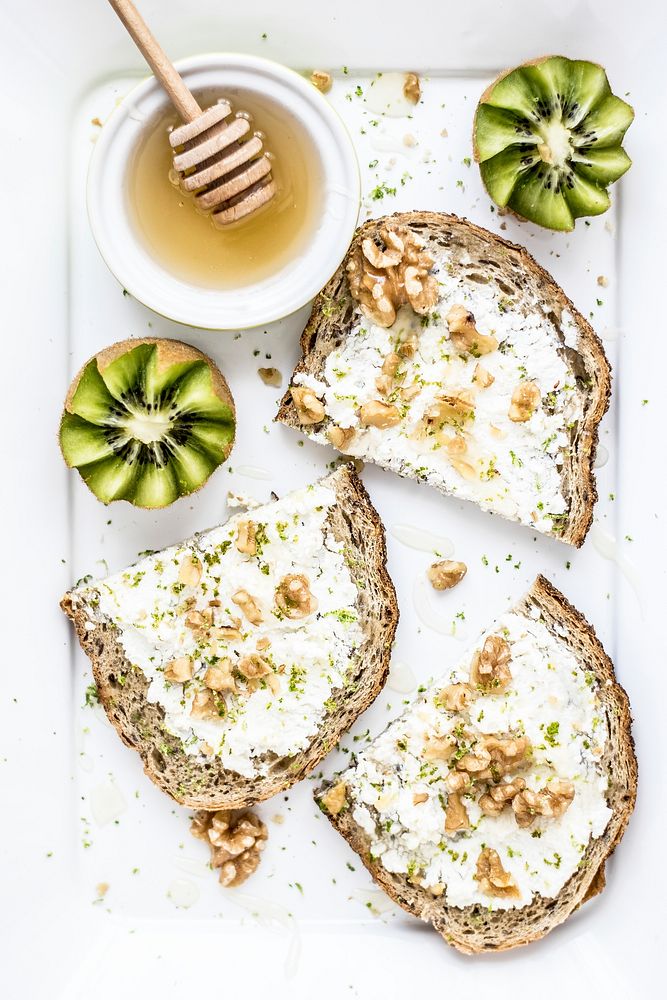 Bread with goat cheese honey and walnuts. Visit Monika Grabkowska to see more of her food photography.