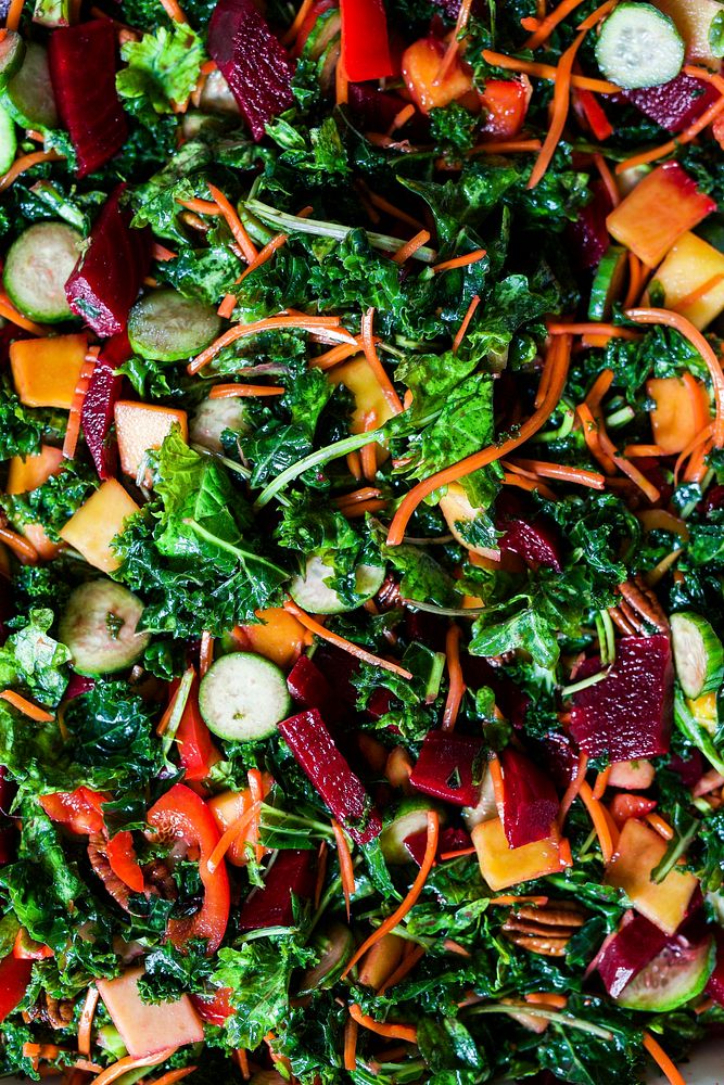 Colorful salad with beet, carrot, zucchini and leafy green