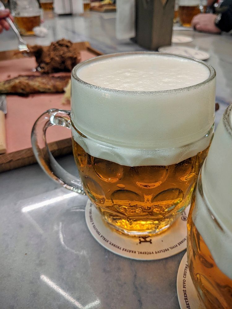 Tapped pilsner beer with a proper foam