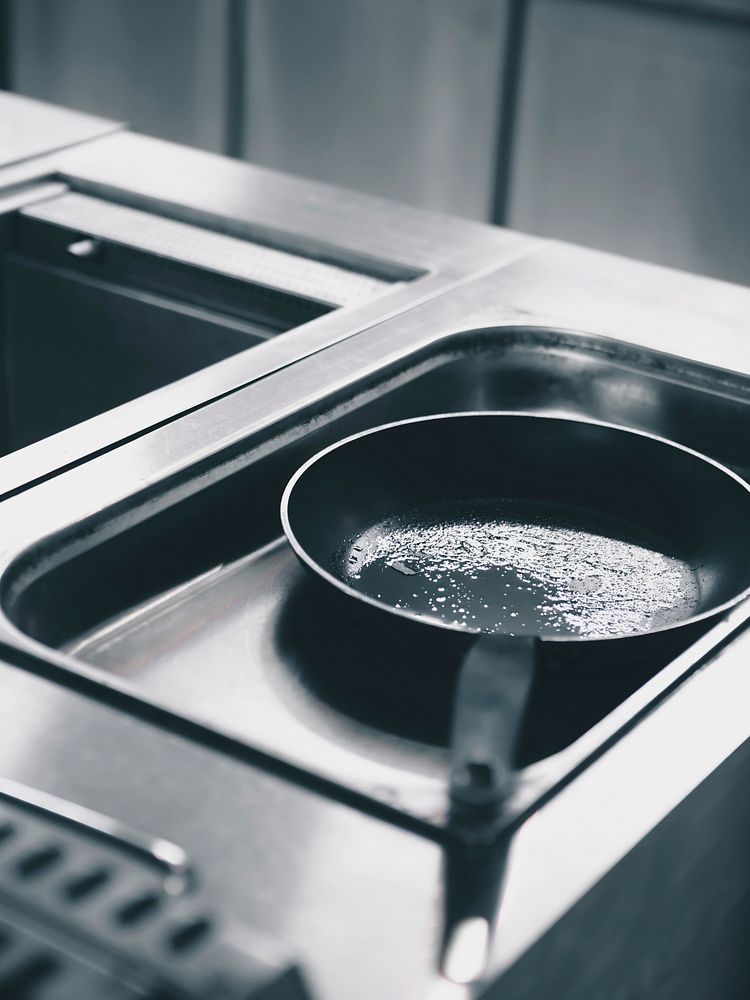 Clean pan with boiling water, free public domain CC0 image.