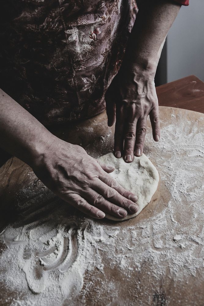 Free man processing dough image, public domain CC0 photo.
