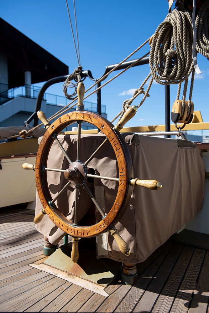 Ship steering wheel. Original public domain image from Flickr
