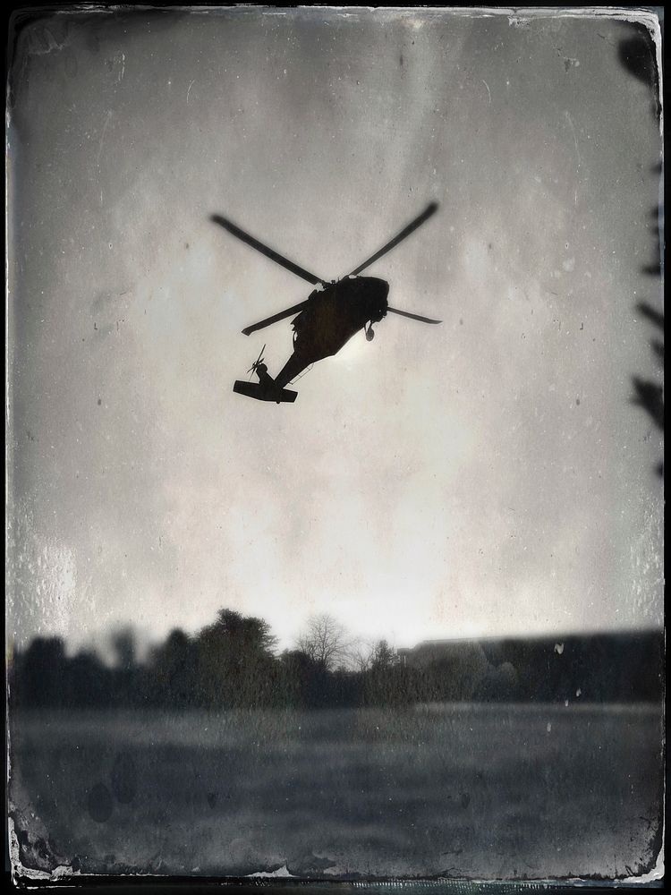 Helicopter taking off. Original public domain image from Flickr