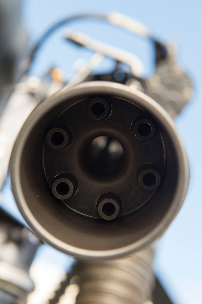 A muzzle view of a GAU-2 7.62 mm minigun recently mounted on an Alaska Air National Guard HH-60G Pave Hawk helicopter with…