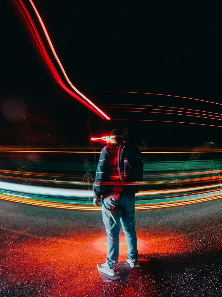 Man standing in traffic. Free public domain CC0 photo.