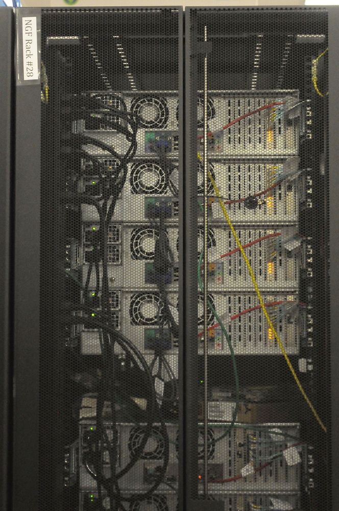 Rear of distributed filesystem servers in rack at NERSC. Free public domain CC0 image.