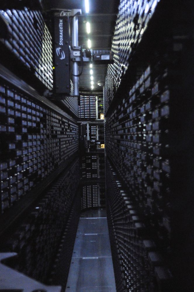 Interior of StorageTek tape library at NERSC. Free public domain CC0 image.