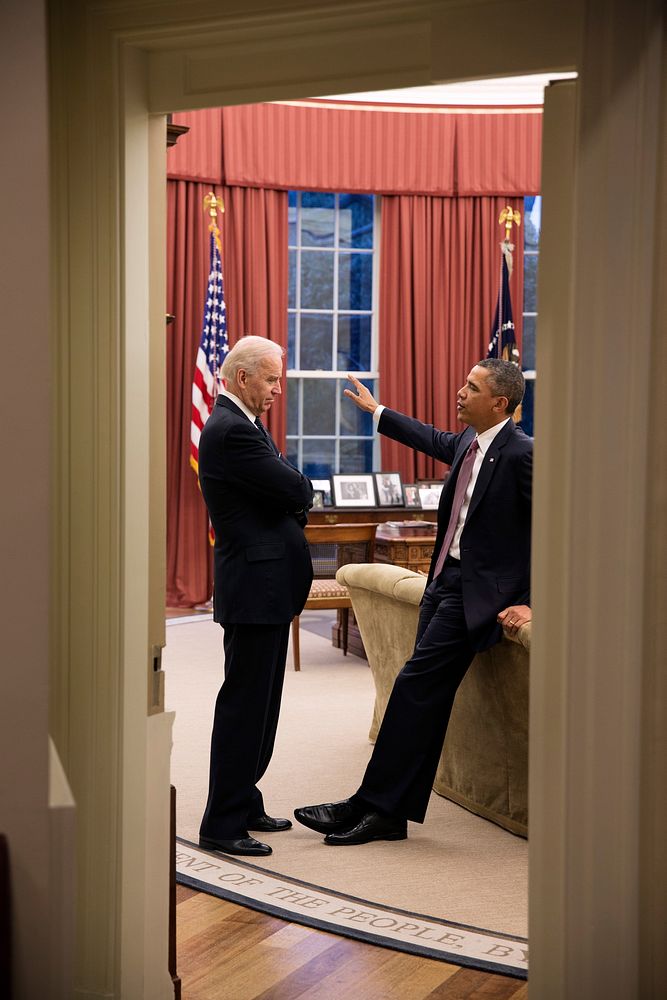 President Barack Obama talks with Vice President Joe Biden in the Oval Office, March 5, 2013.