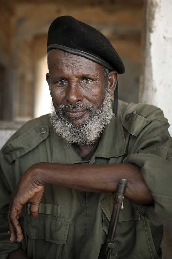 A soldier belonging to the Somali National Army sits at the group's headquarters in Kismayo, Somalia, on September 21.