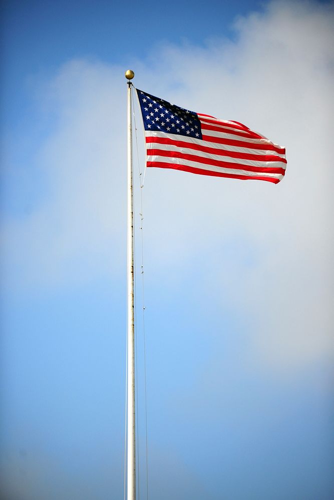 U.S. Flag over Presidio. The flag flies above the Presidio of Monterey's Soldier Field. Original public domain image from…