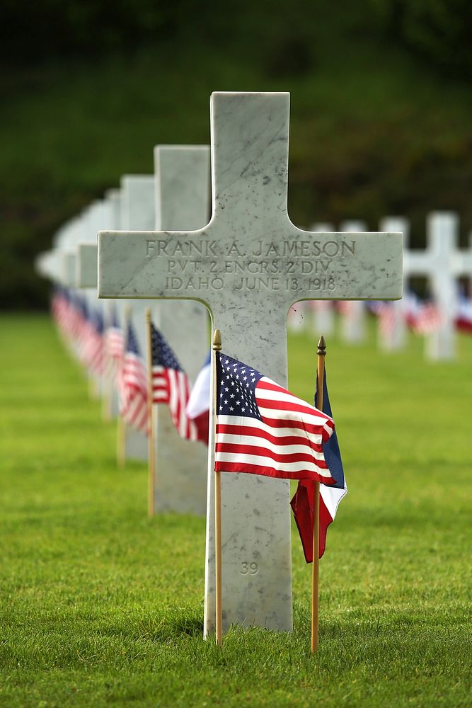 A grave site can be seen as U.S. Marines and their French counterparts gather at Aisne-Marne American Cemetery and Memorial…