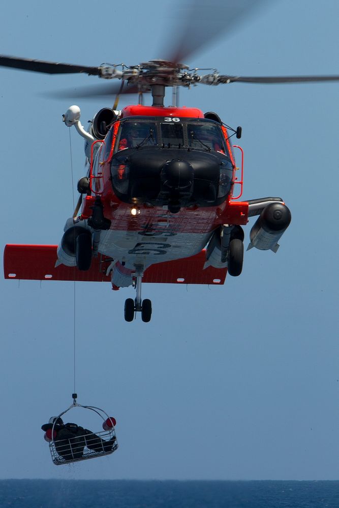 U.S. Coast Guardsmen with Coast Guard Station San Diego participate in a search and rescue exercise (SAREX) in an HH-60J…