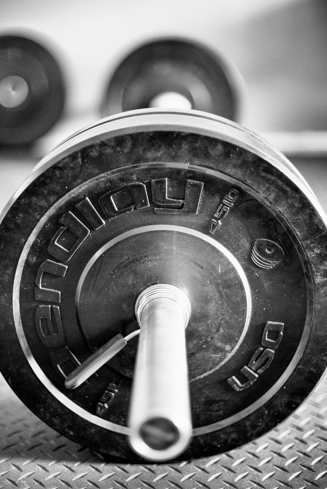 Closeup on barbell with weights. Free public domain CC0 image. 