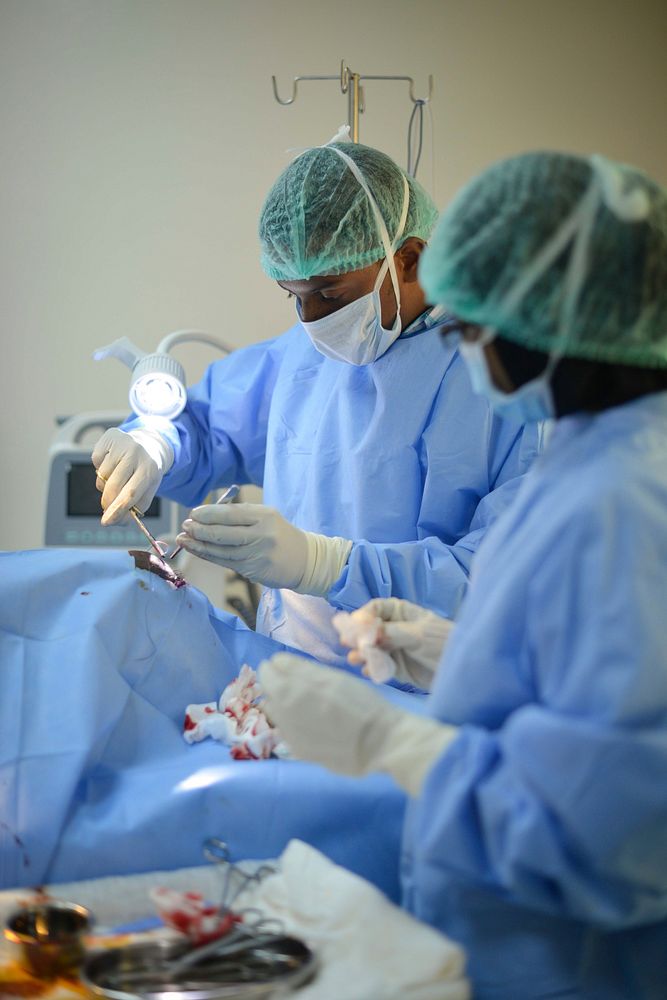 A doctor performs minor surgery in order to remove a lymphatic cyst at the Sheikh Zayed Bin Sultan Al'Nahya Hospital in…