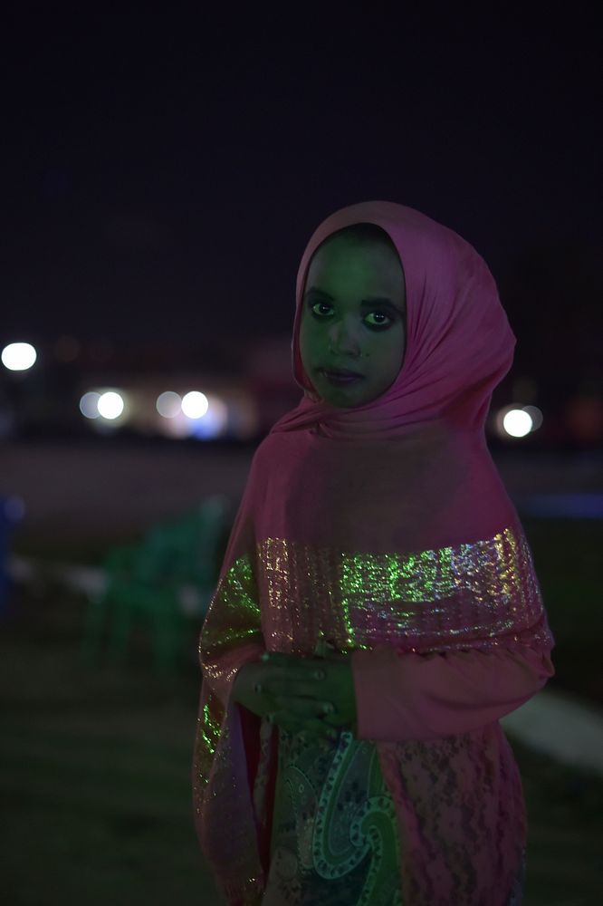 A young girl poses for the camera while playing in the playground of the Peace Gardens in Mogadishu, Somalia, on July 23.…