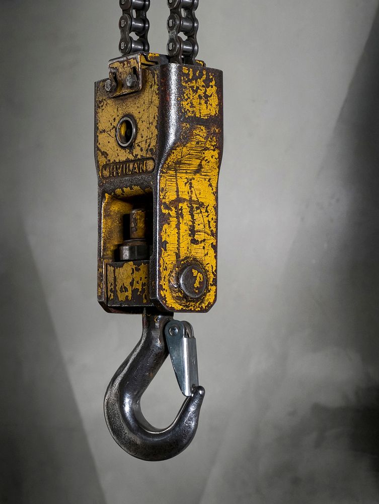 Lifting hook with safety latch. Free public domain CC0 photo.